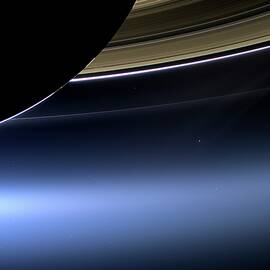 Earth And Moon From Saturn by Science Photo Library