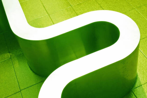 Curved Green Structure on Tiled Floor Wall Art